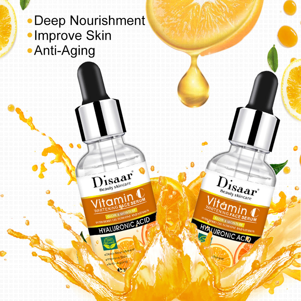 seo Hyaluronic Acid Vitamin C Face Serum Whitening bottles with splashes of orange juice